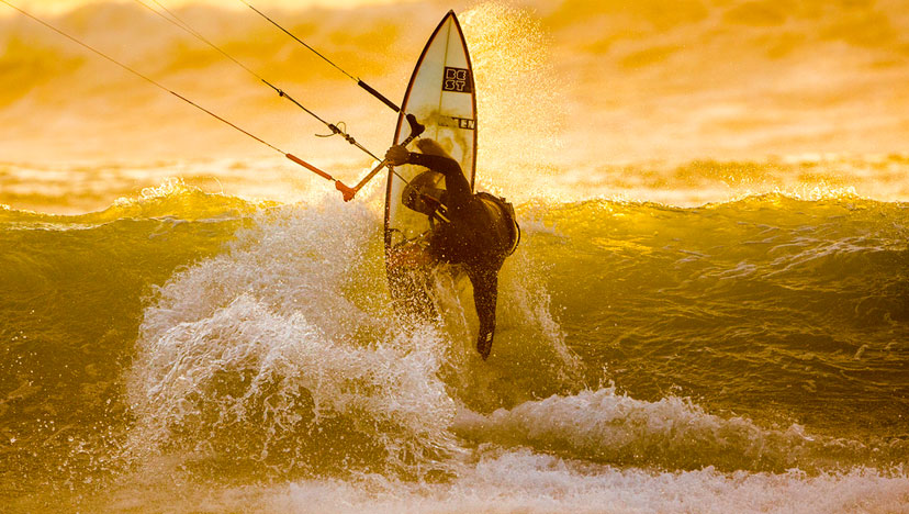 Wave surfing with the kite in Tarifa.