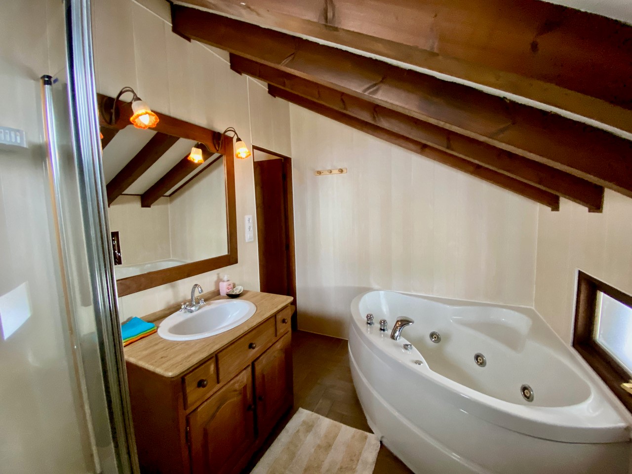 Bathroom ensuite with bath and shower