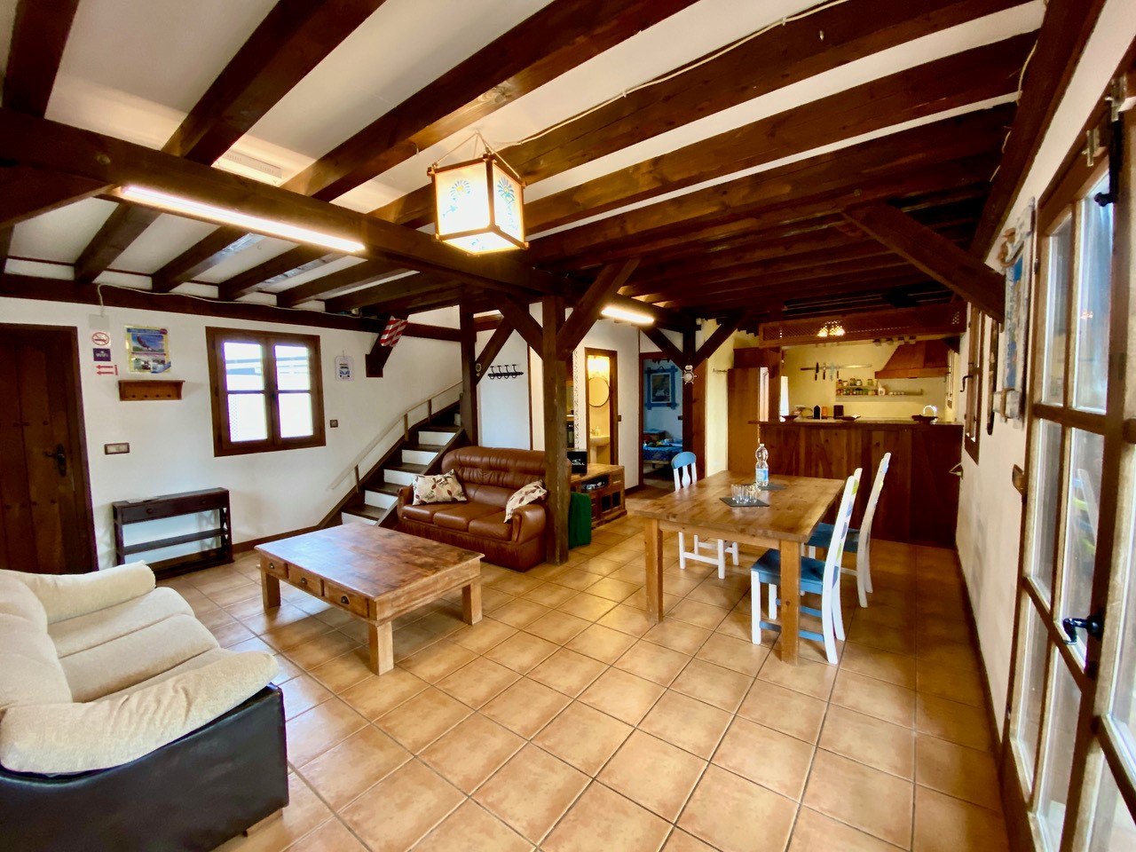Living room with american kitchen