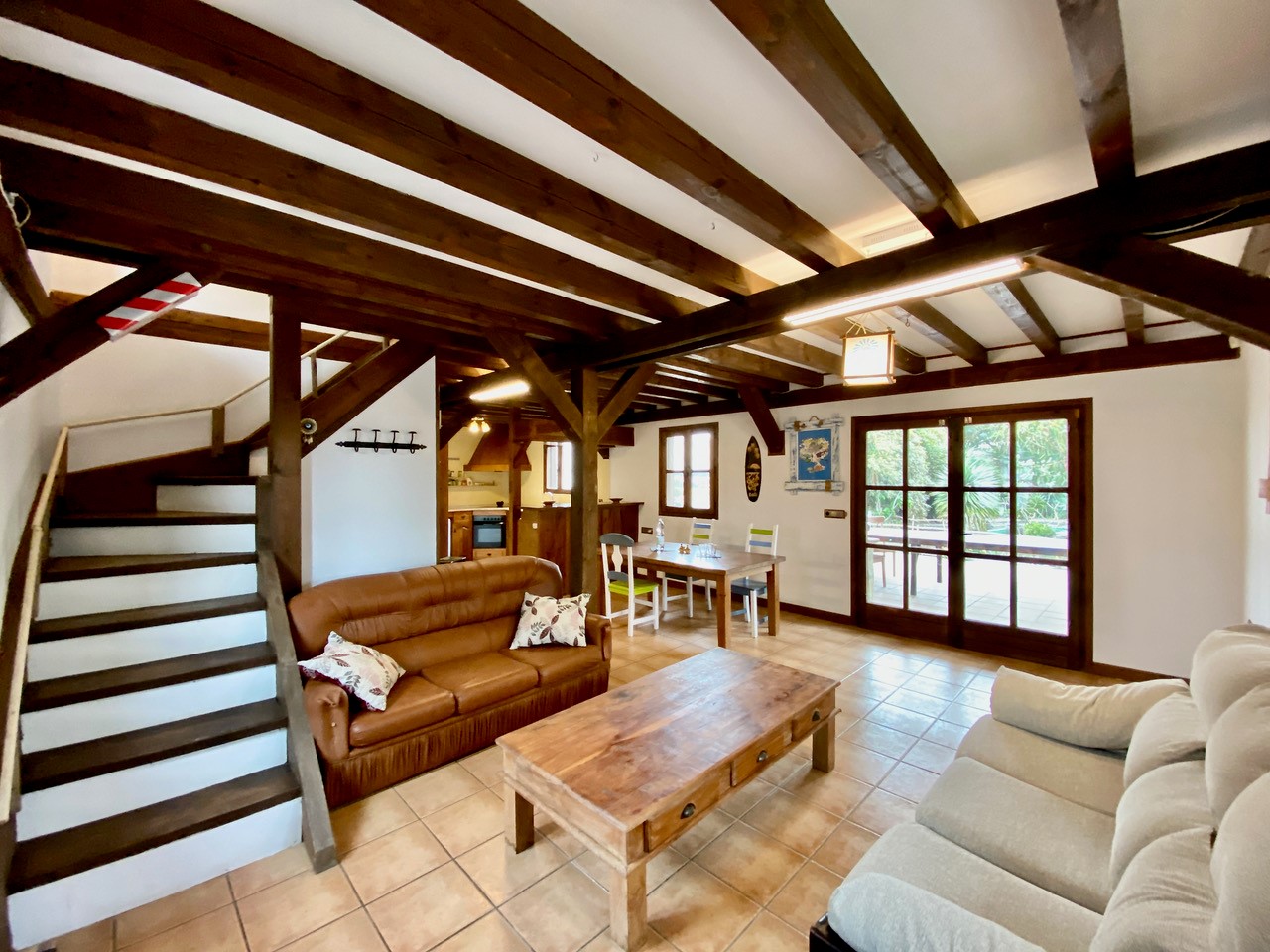 Living room with entrance to terrace